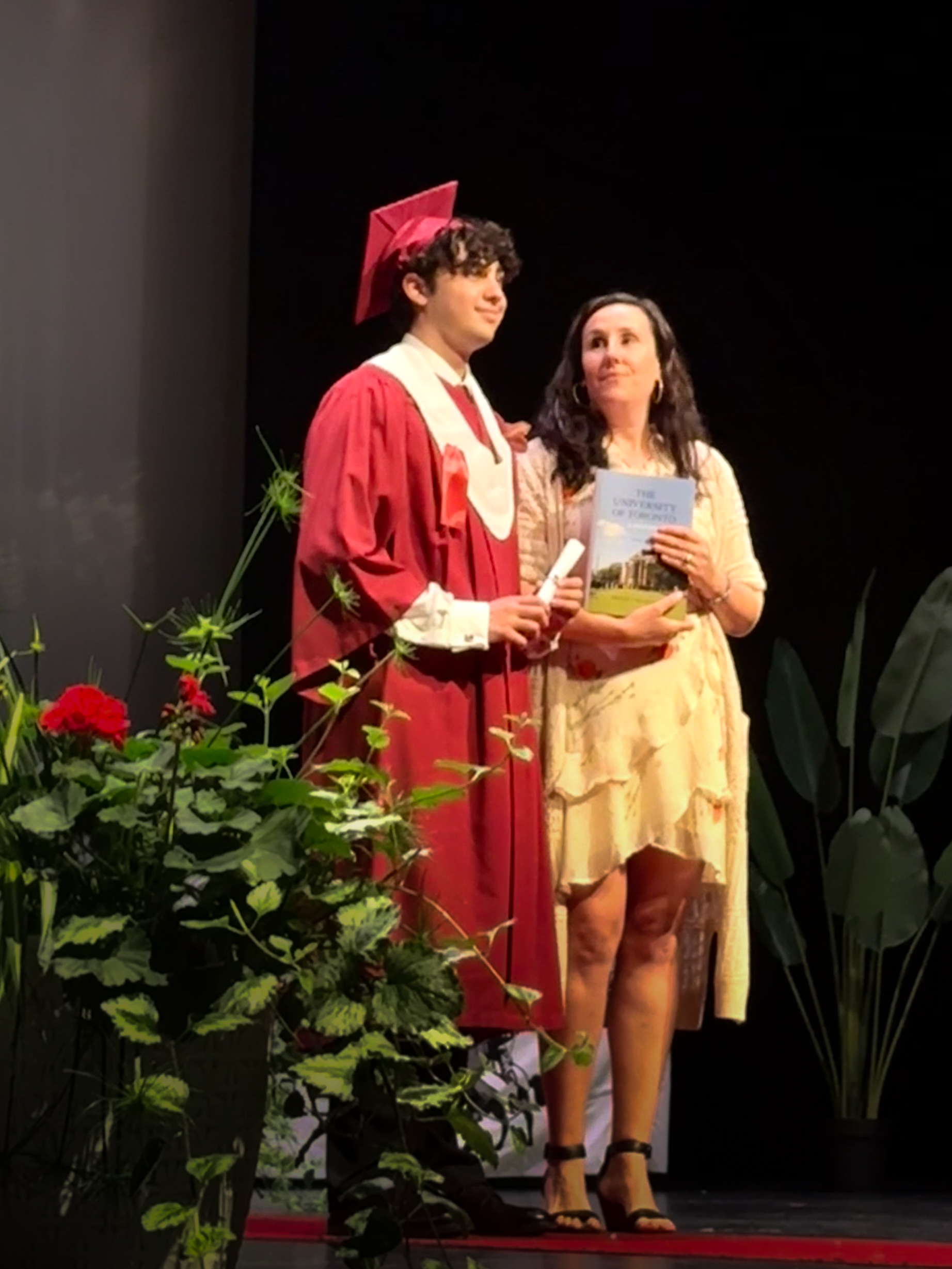 Cyrus receiving the UofT National Book Award
